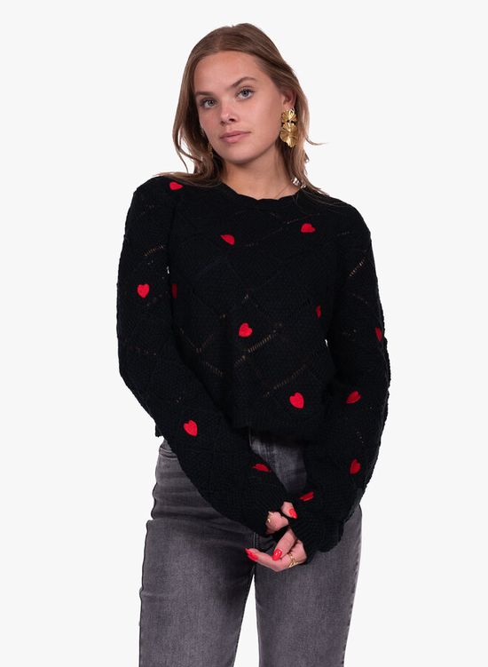 Zwarte trui met rode hartjes